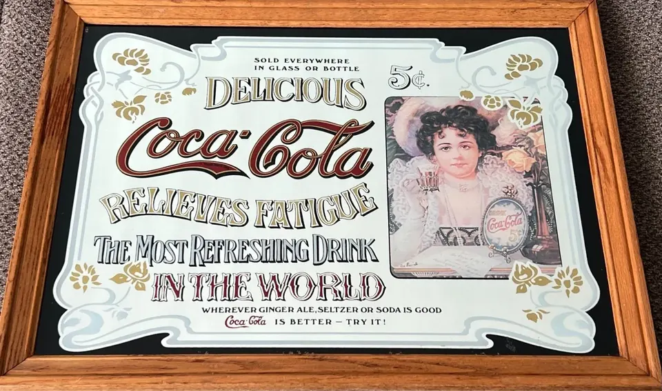 Framed vintage Coca-Cola advertising mirror